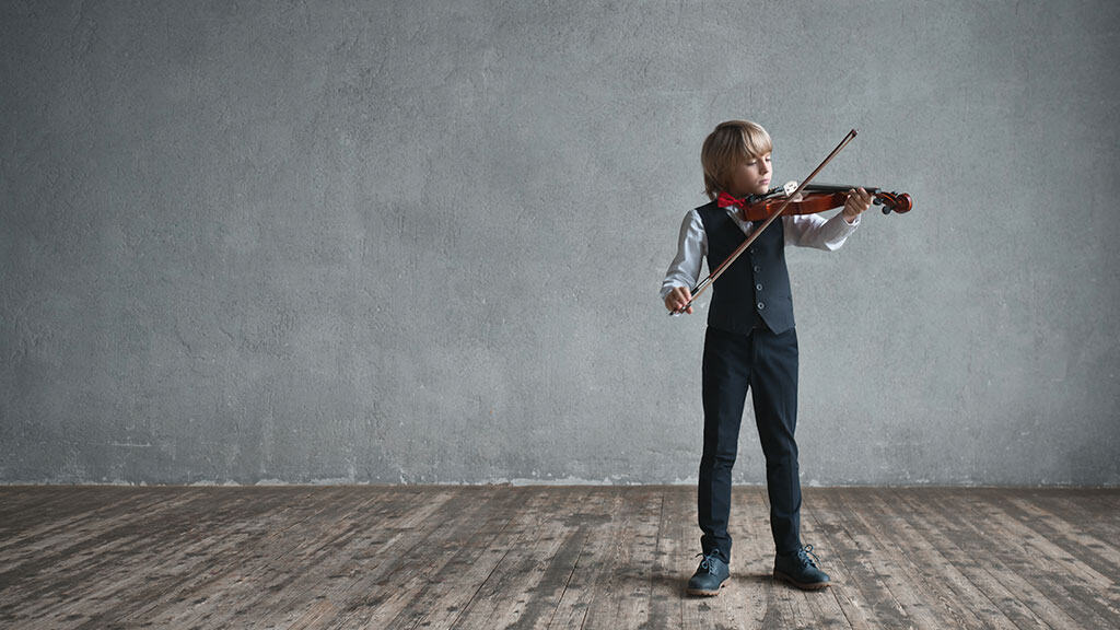 boy playing banner